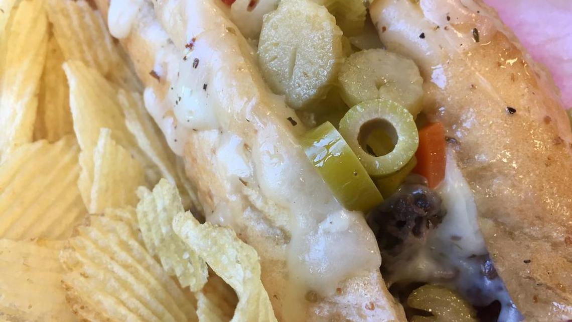 An Italian beef “wet” and “hot” with juice and peppers at Weinberger’s Deli.