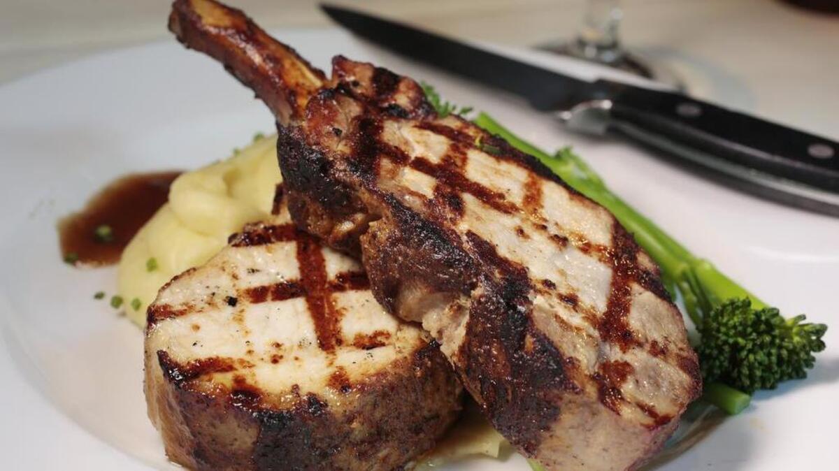 A double-cut pork chop at Mercury Chop House.