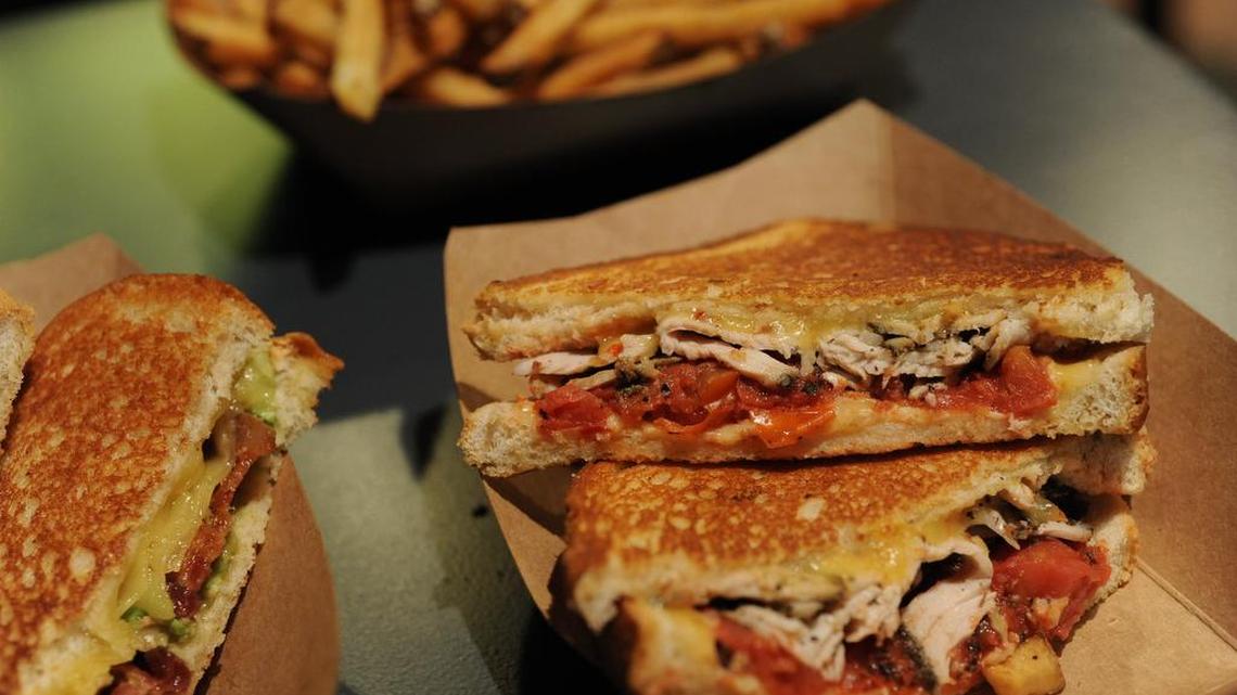 Chipotle gouda, herb-roasted turkey and fire-roasted garlic-tomatoes sandwich at Lee's Grilled Cheese.