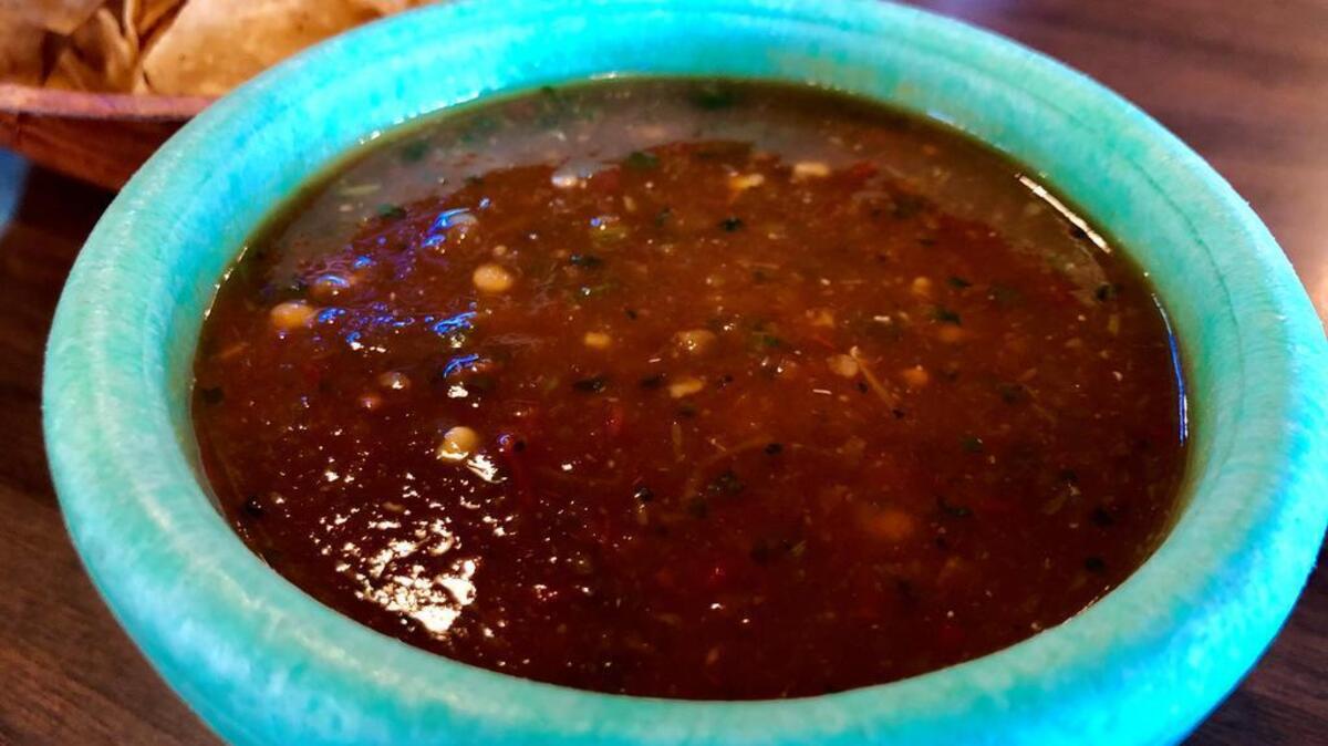 The hot sauce at Los Asaderos has regained its fire.