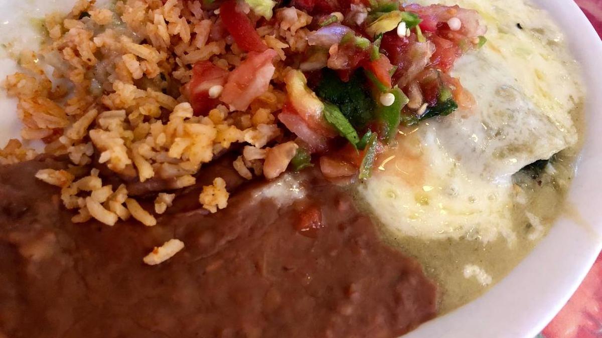 Spinach enchiladas with green mole at Benito’s: $6.75 at lunch.