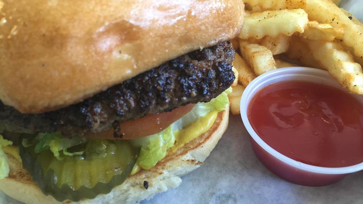 Fuego Burger’s basic burger is a bargain at $5.88 (crinkle fries extra).