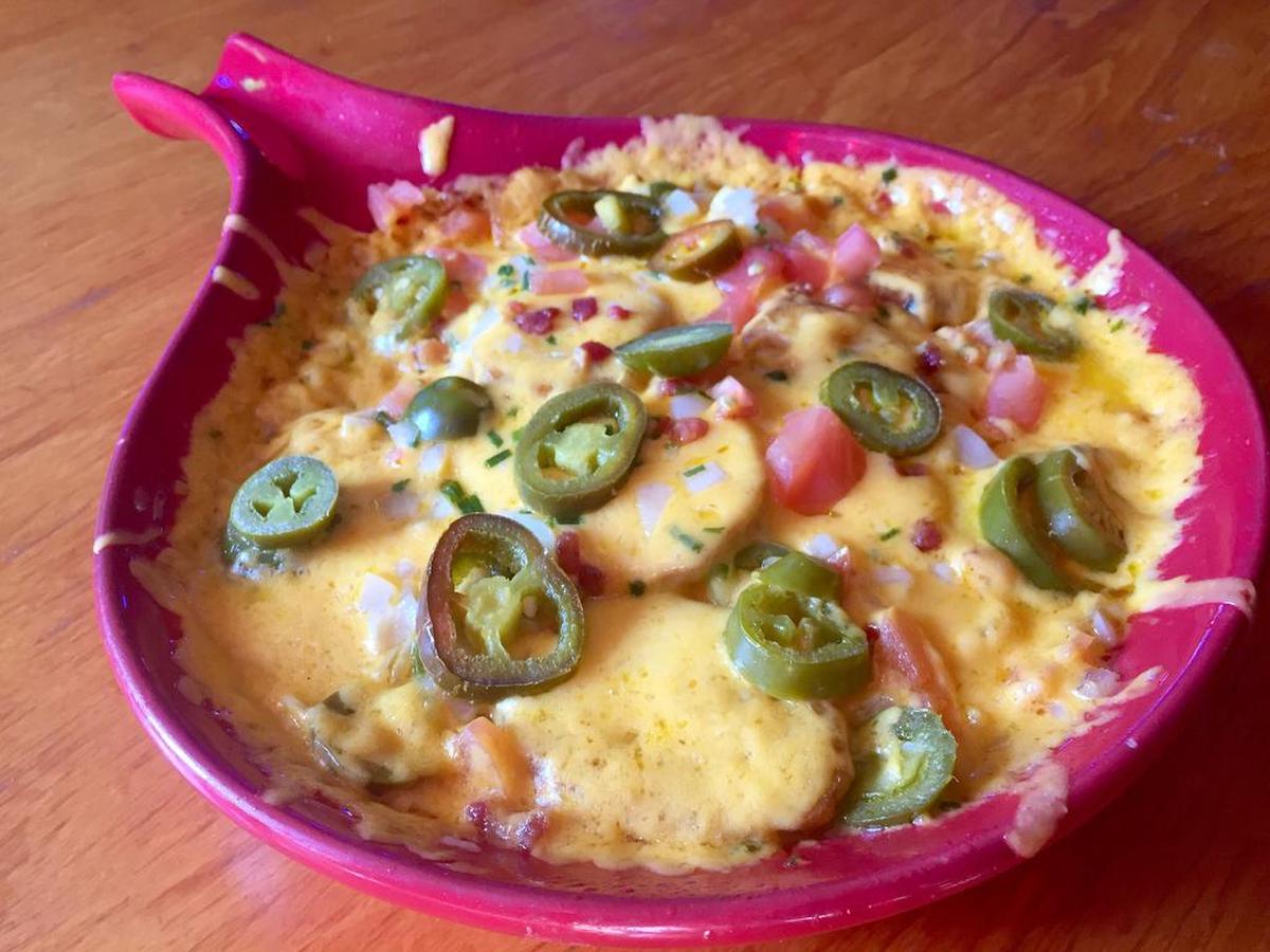 “Irish nachos,” made with potato skins, originated in 1980 at J. Gilligan’s, an Arlington favorite that’s not far from AT&T Stadium