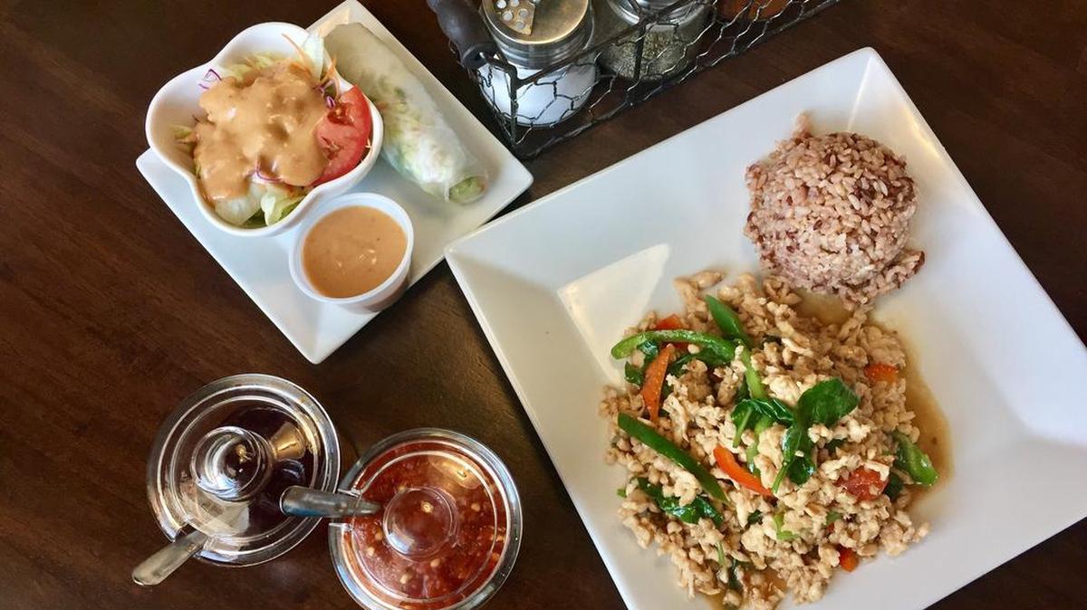A chicken with spicy basil (“kra prow”) lunch special is less than $10 at The Bangkok, near Alliance Town Center.
