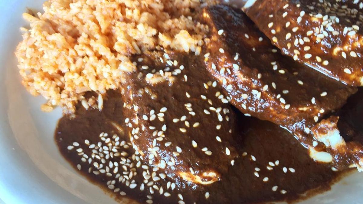 The sliced chicken mole at Frida’s Mexican Flavors,which is on the Fort Worth-Haltom City border.