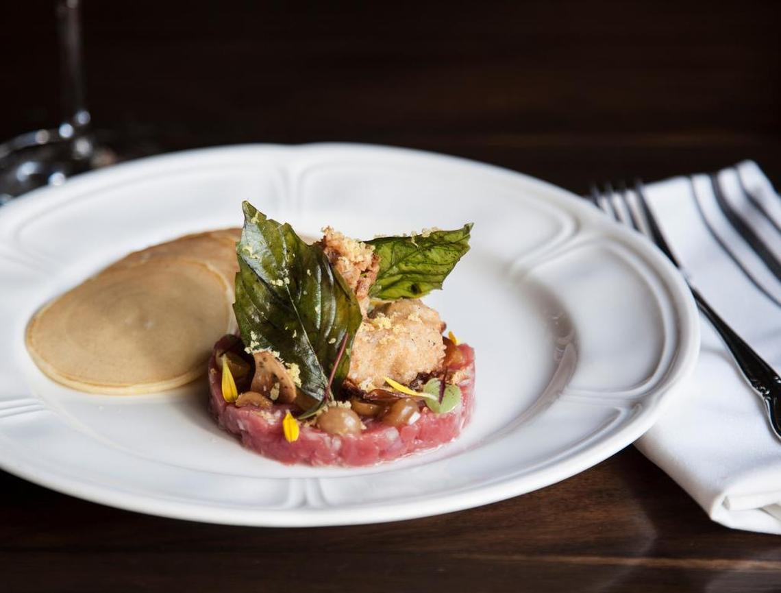 Beef tartare, crispy oysters, pickled gooseberry, cornmeal pancakes and celery root remoulade at Fixe, opening soon in The Shops at Clearfork