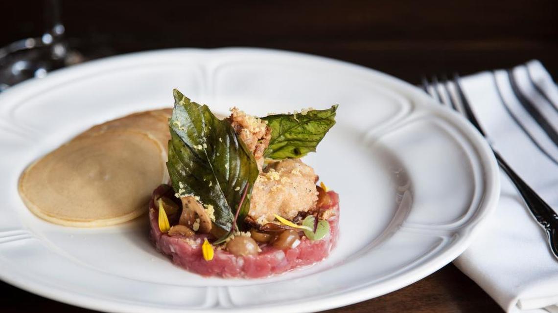 Beef tartare, crispy oysters, pickled gooseberry, cornmeal pancakes and celery root remoulade at Fixe, opening soon in The Shops at Clearfork