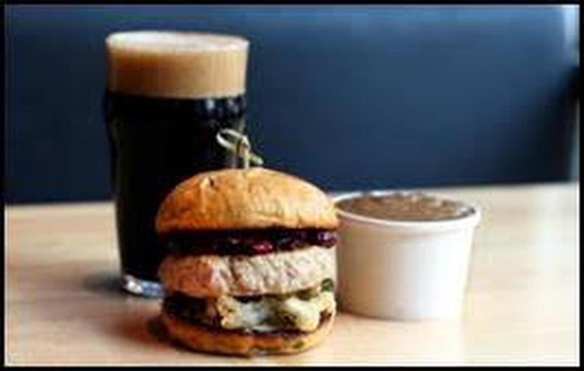 Hopdoddy Burger Bar’s “Turducken” Burger.