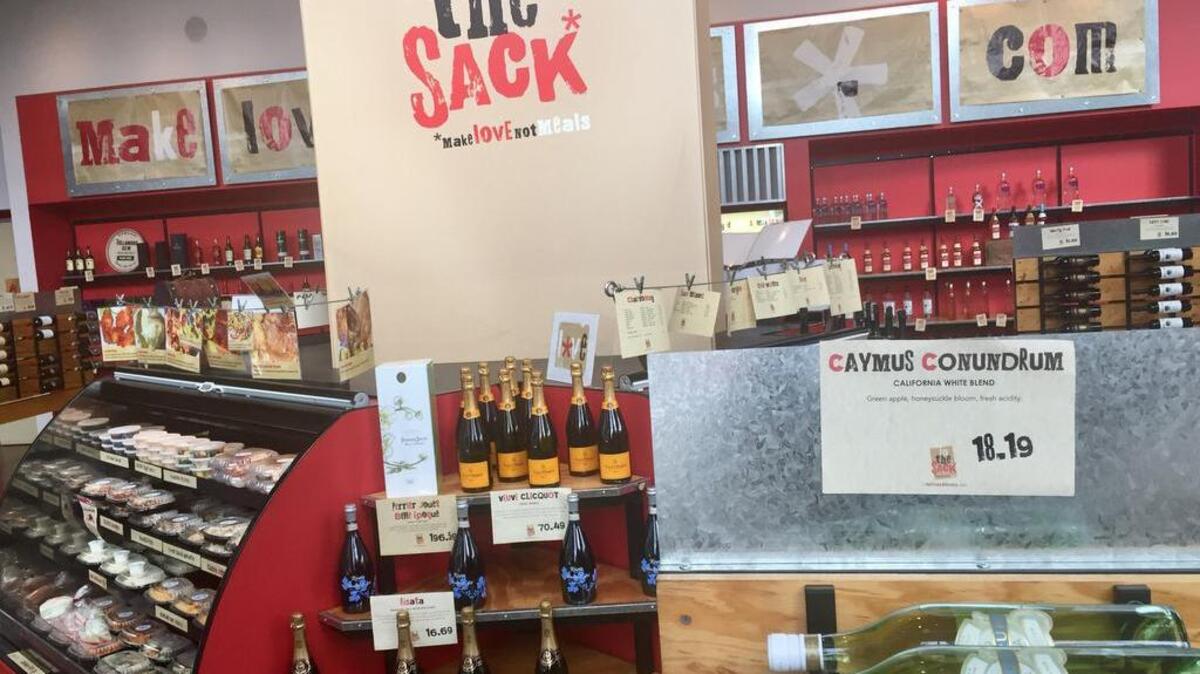 In the Sack, which offers free delivery of gourmet wines, liquors, sandwiches and prepared meals, will open in Sundance Square this summer.