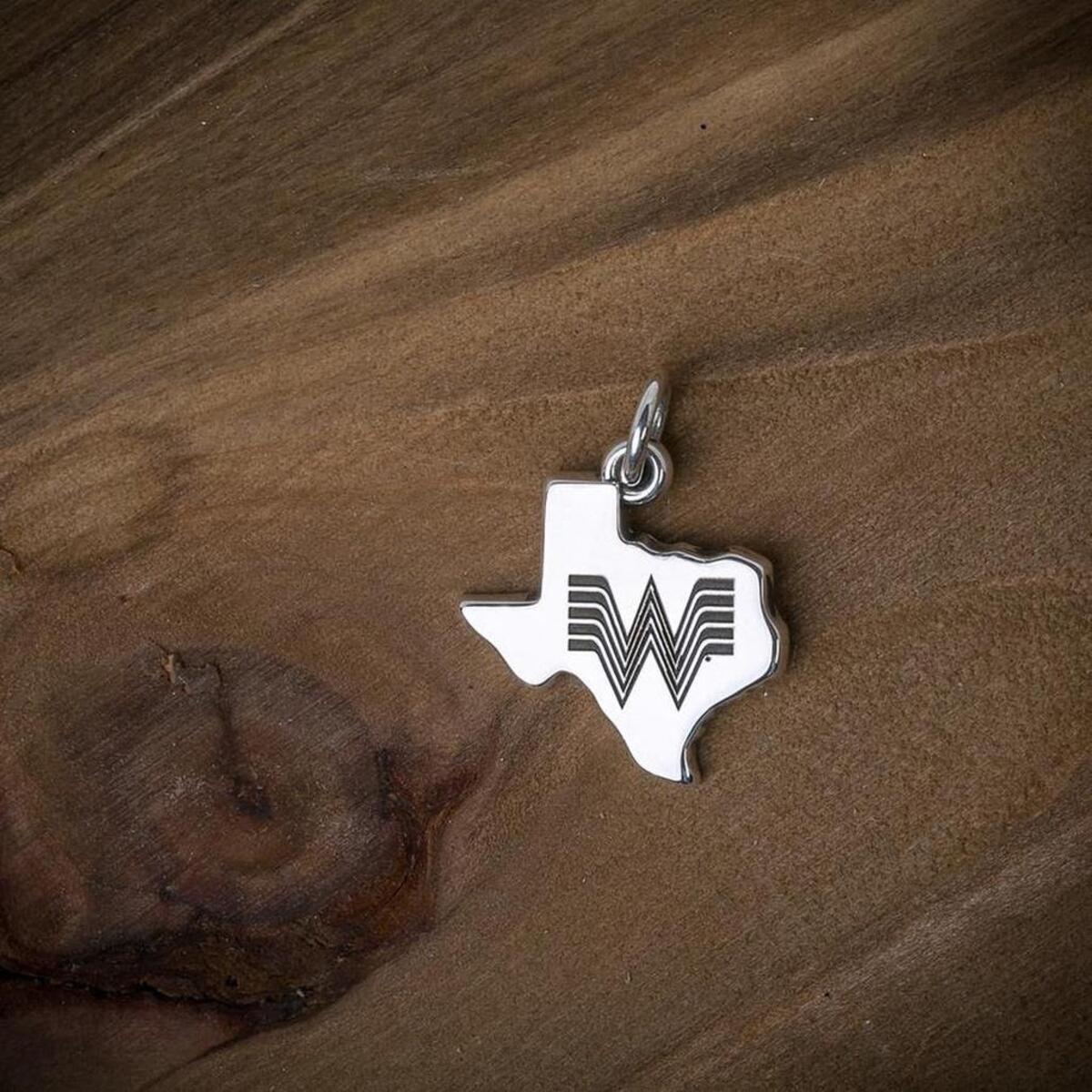 The Texas-shaped charm is engraved with the Whataburger’s iconic flying W.