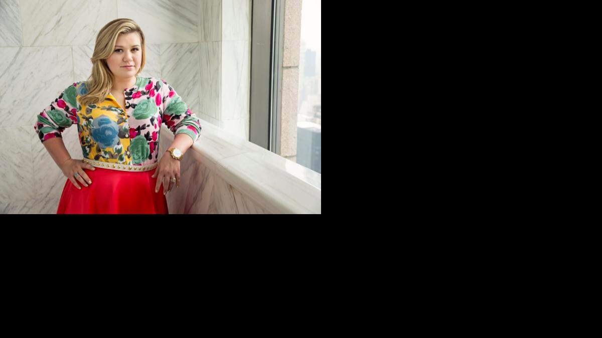 
Kelly Clarkson in a promotional shot for her new album Piece by Piece, taken March 4 at the Sony Club in New York.
