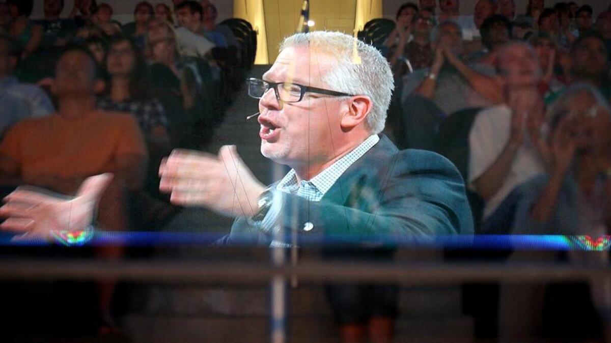 Glenn Beck speaks during his Restoring Love event July 28, 2012, at Cowboys Stadium in Arlington.