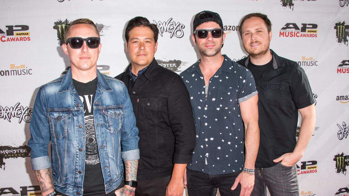 Ryan Key, from left, Sean Mackin, Josh Portman and Ryan Mendez of Yellowcard arrive at the 2016 Journeys AP Music Awards at Value City Arena at the Jerome Schottenstein Center on Monday, July 18, 2016, in Columbus, Ohio.