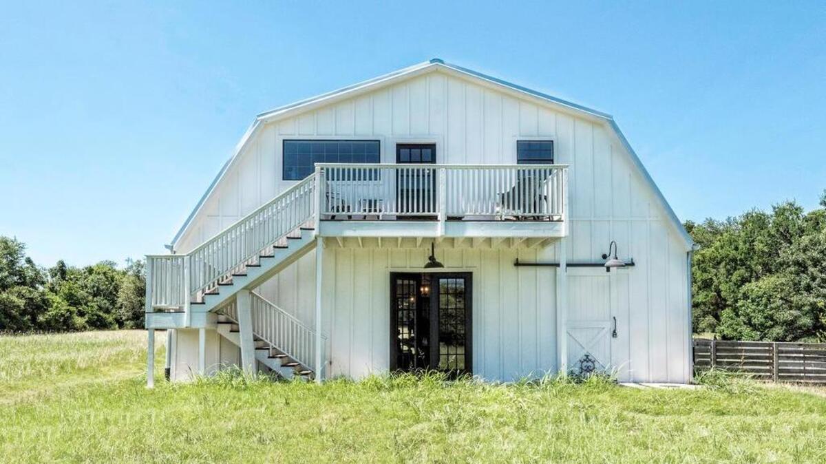 The famous Waco “Barndominium” from HGTV’s ‘Fixer Upper,’ at 123 Spring Creek Street in Lacy Lakeview, Texas.