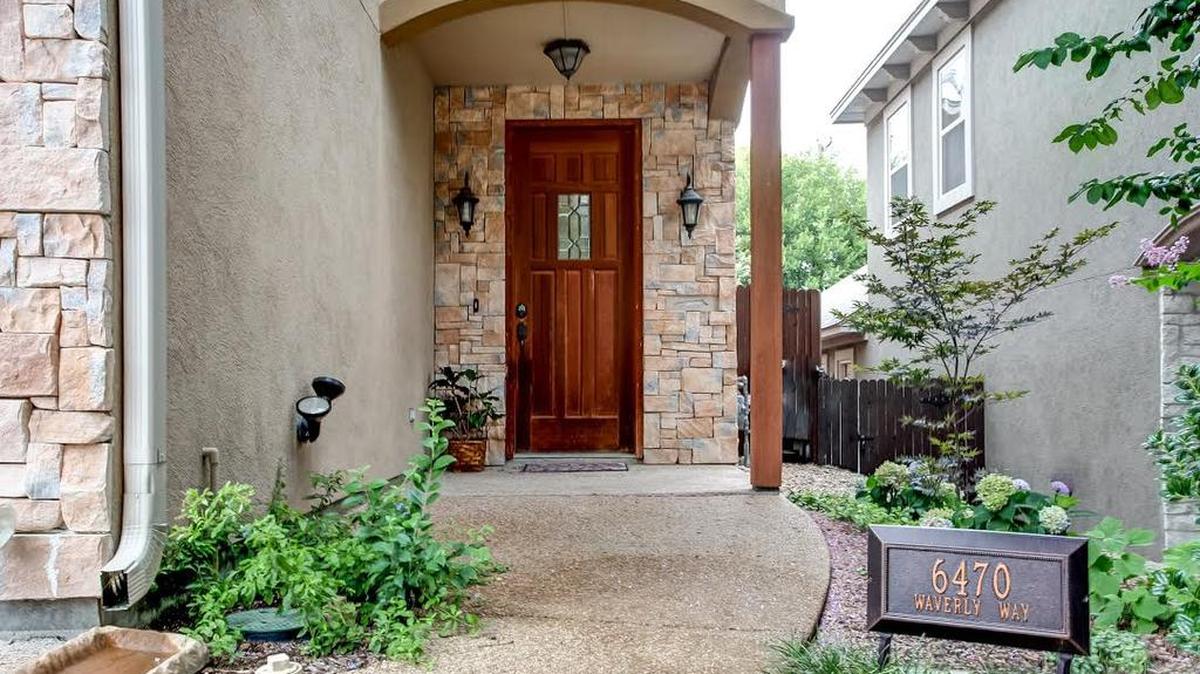 The half-duplex at 6470 Waverly Way is priced $349,900.