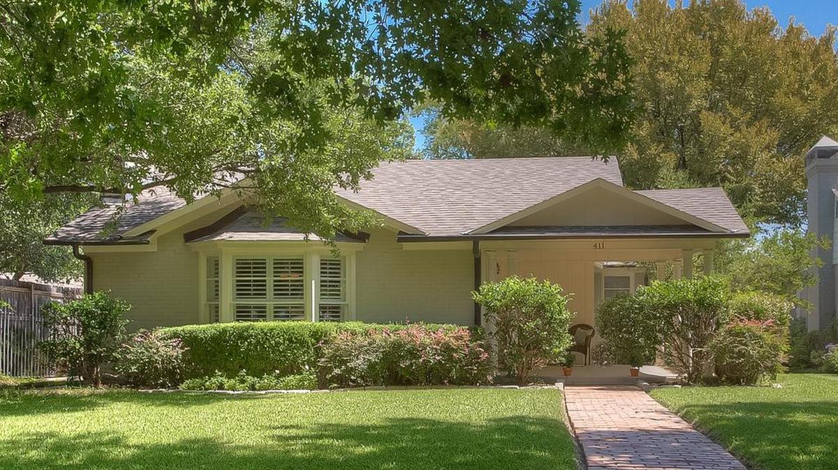 The home at 411 Monticello Drive is open Sunday, September 24 from 2 to 4 p.m.