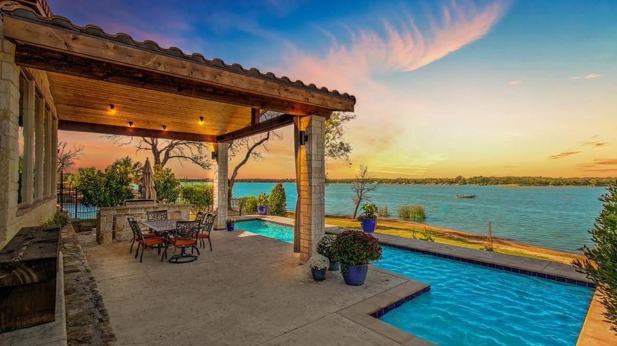 The home at 10039 Lakeside Drive is priced $679,900.