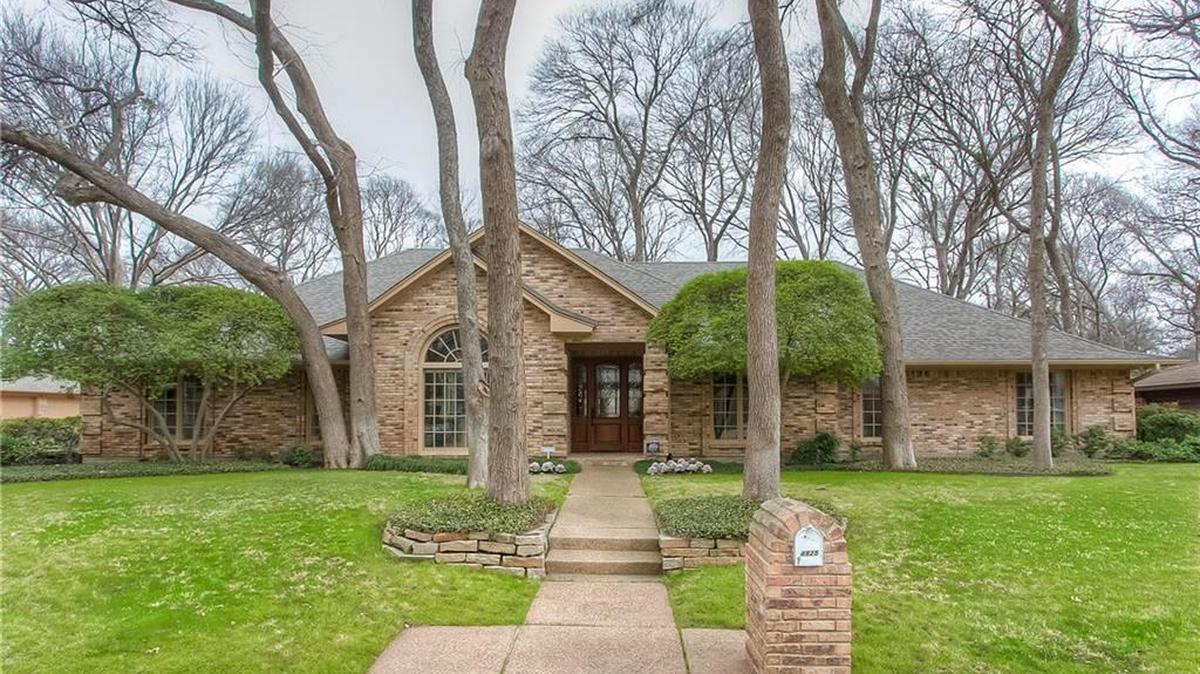 The home at 4825 Overton Woods Drive is priced $769,000.
