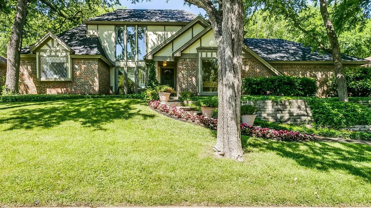 The Tudor-style home at 4112 Inwood Road is priced $485,000.