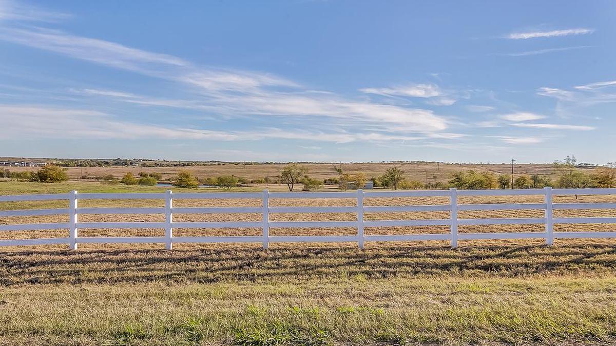 The five-acre lot at 166B John Chisholm Road is priced $215,000 with an additional 6.2 acres available for purchase
