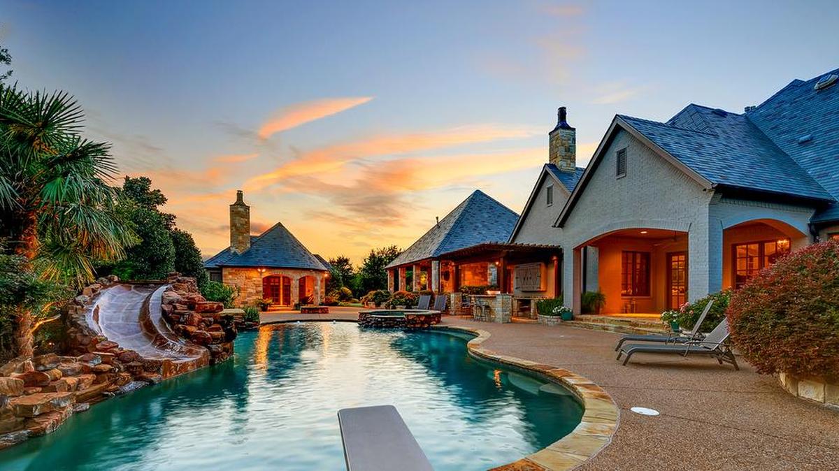 The home at 4649 Saint Laurent Court is situated on over 1.5 acres.