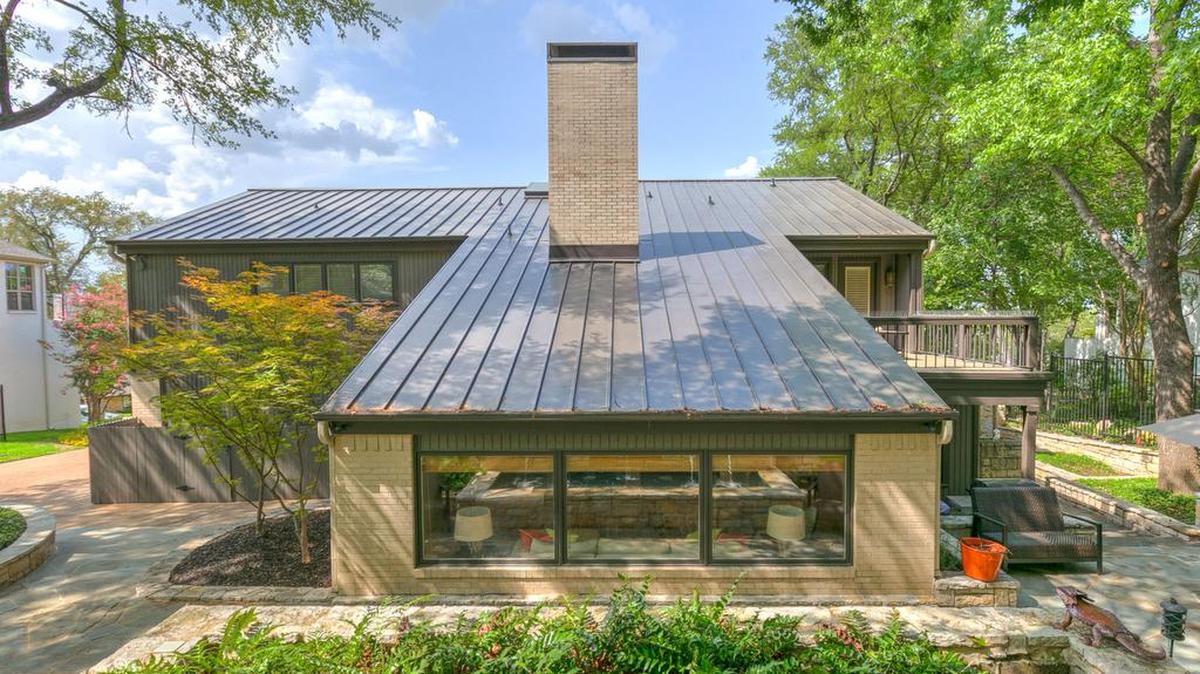 The Contemporary home at 4501 Overton Terrace Court is represented by Ashley Mooring of Briggs Freeman Sotheby’s International Realty and is priced $849,000.