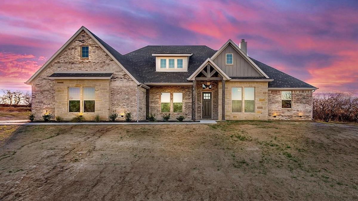 The home at 121 Saddle Horn Trail is priced $415,000.