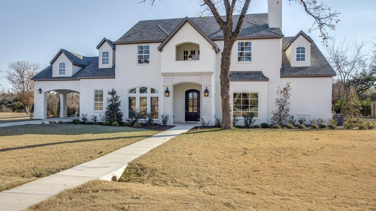 The home at 12801 Villa Milano Drive is priced $925,000.