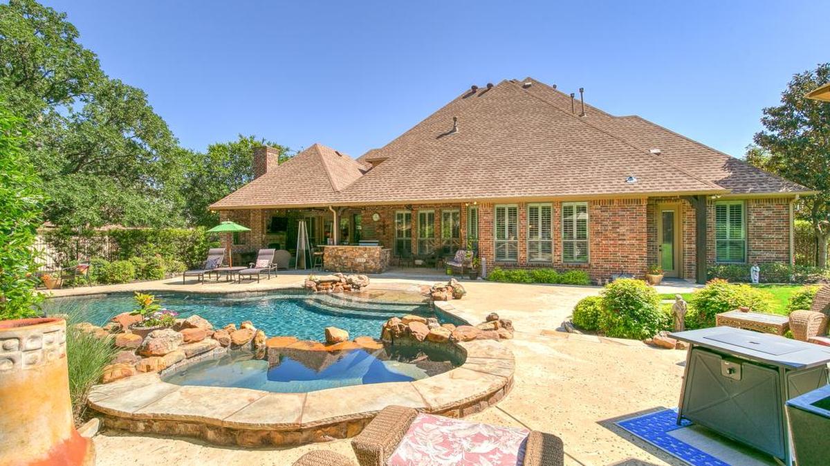 The home at 2325 Ember Woods Drive is priced $845,000.