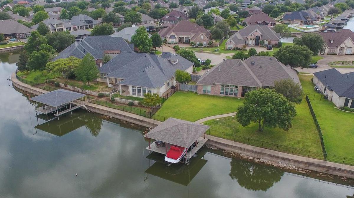 The home at 1205 Cliff Swallow Drive is priced $497,000.