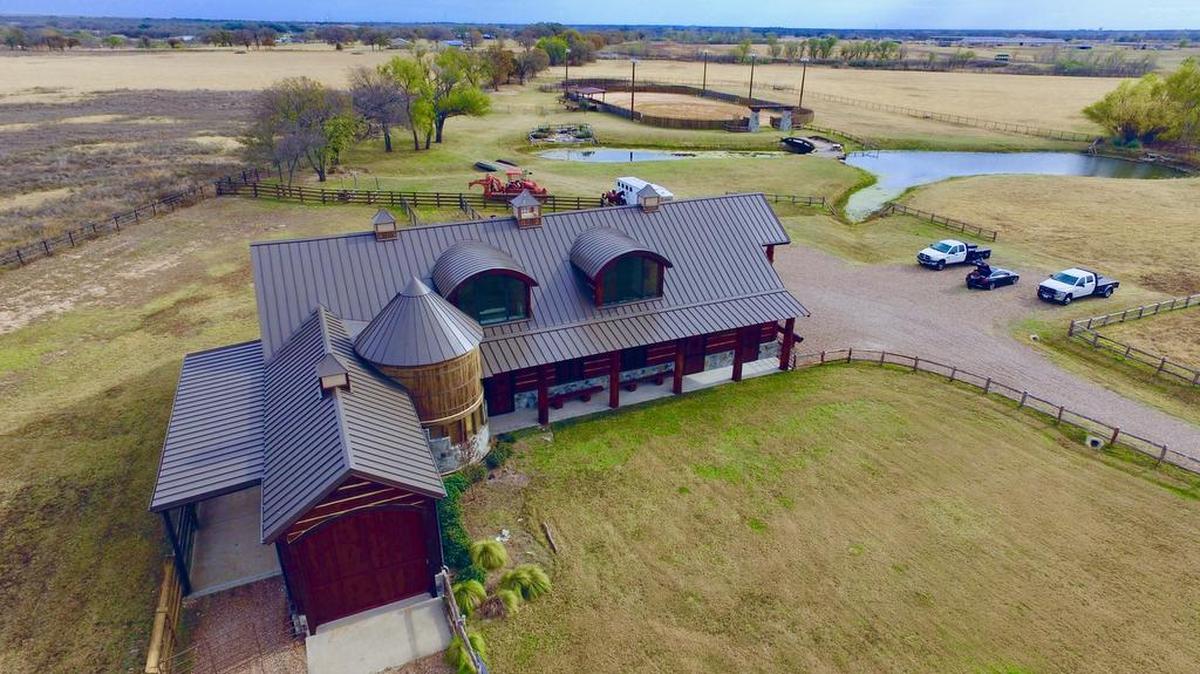 The property at 1824 Nutt Grove Court is priced $1,100,000. An adjacent fenced pasture is priced $300,000.