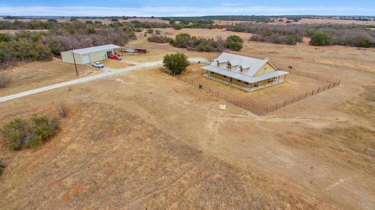The home at 8222 N FM 1189 is priced $899,000.