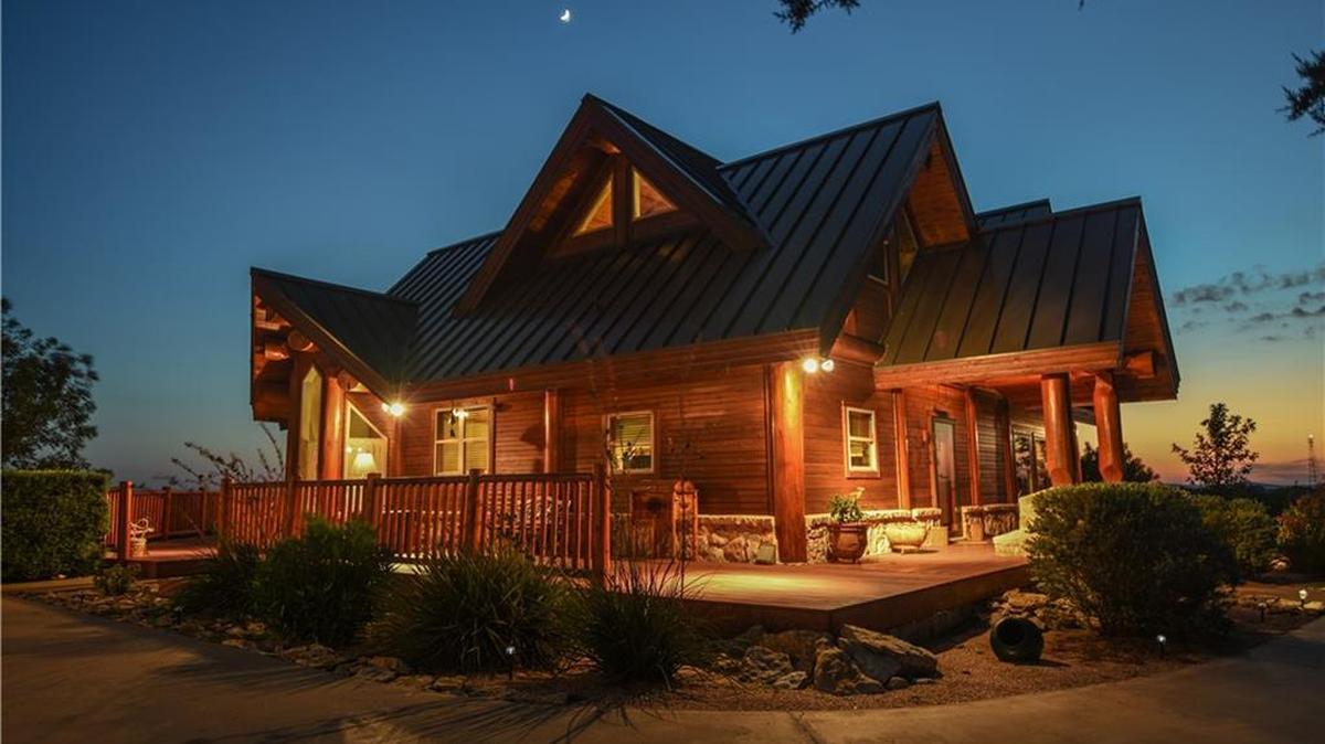 The home at 1205 Caprock Court was built with huge white Douglas fir logs.