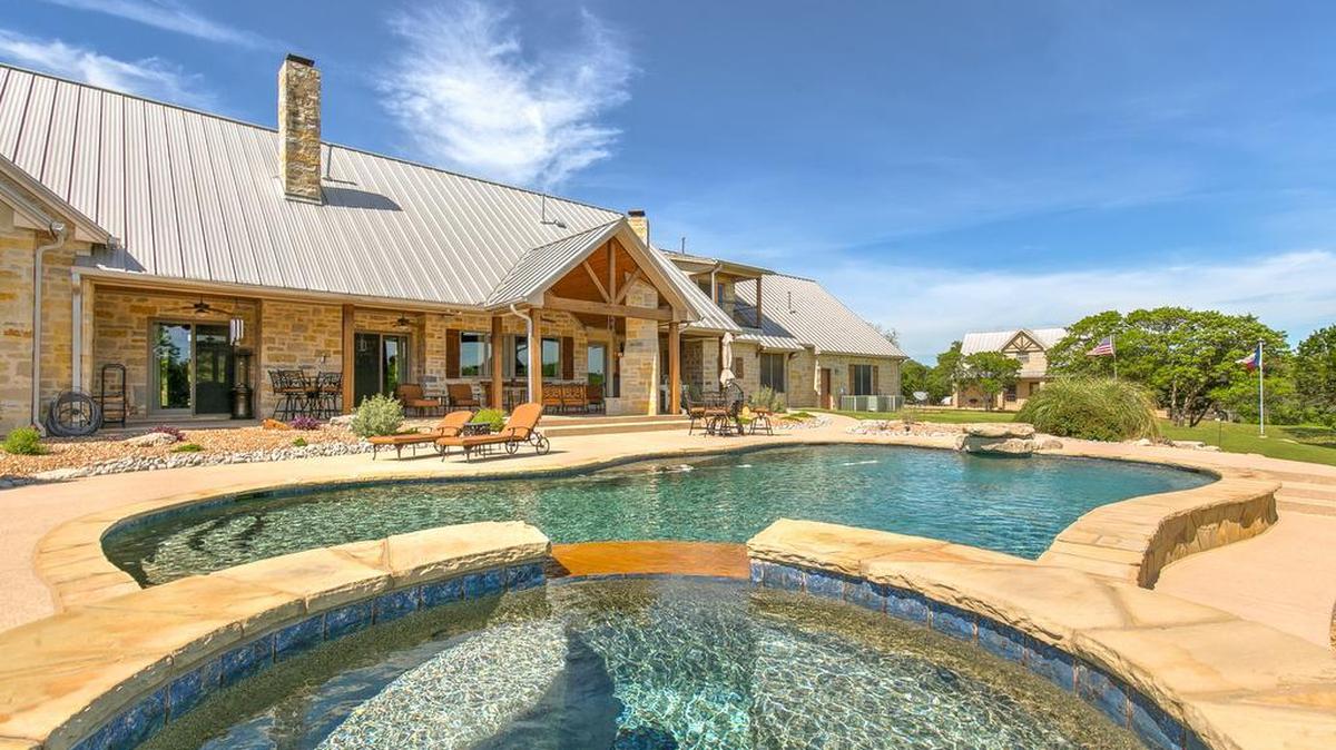 The home at 954 Cactus Rio Drive is located on 13.60 AG exempt acres, fully fenced.