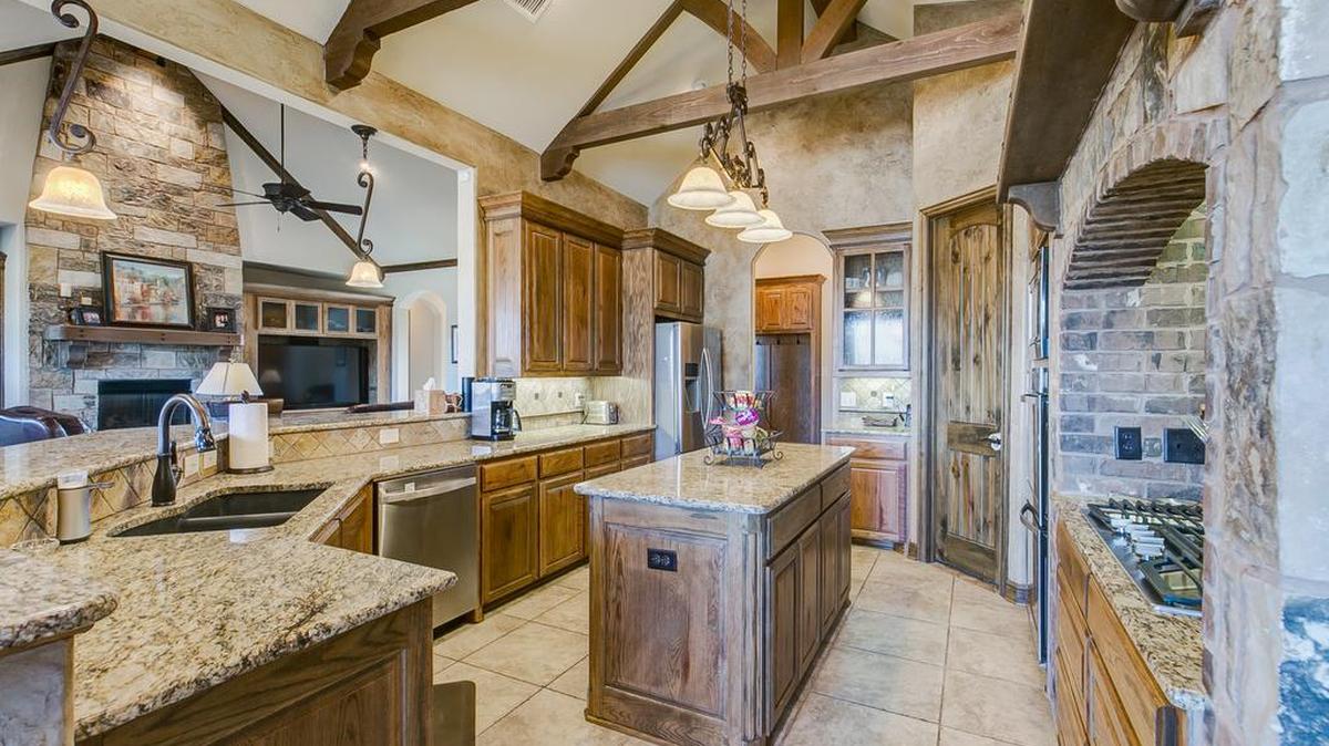 Built in the architecture style known as Traditional, 1240 Whisper Willows Drive is priced $512,000.