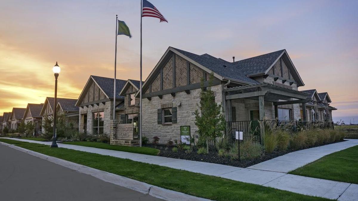 Smart-size to a manageable villa townhome by Grenadier Homes in a coveted North Arlington master-planned community.
