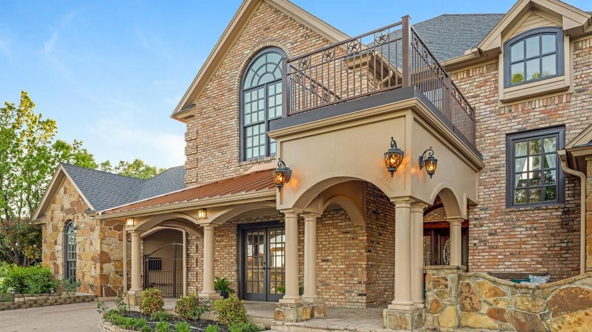 The home at 116 Woodland Hills Drive, a textbook example of traditional architecture is priced $600,000.