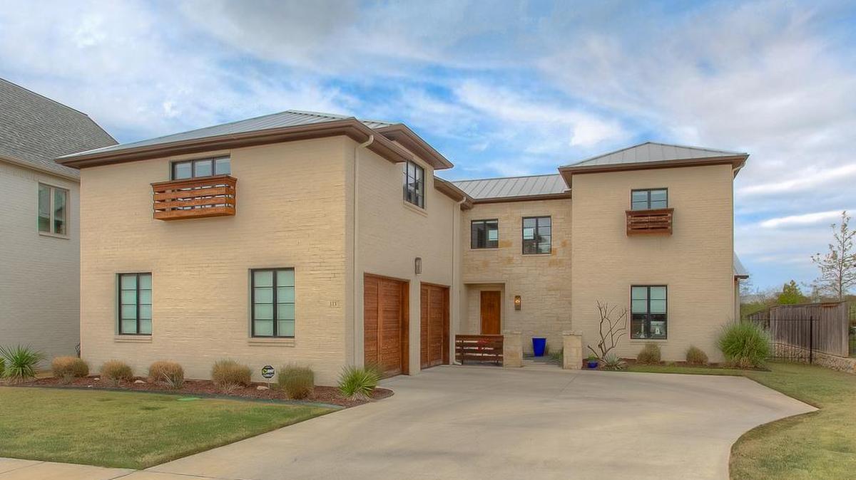 The home at 313 Creekwood Terrace is priced $604,000.