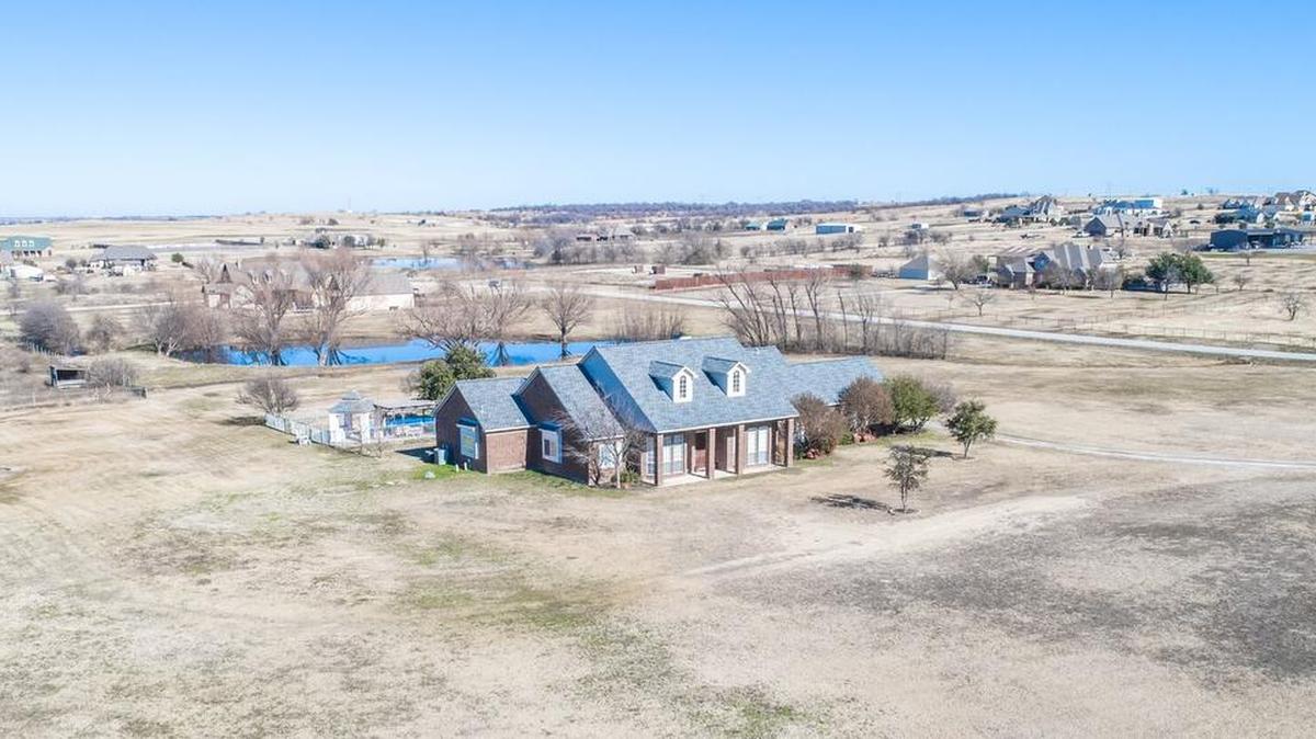 The home at 4800 Wind Hill Court West is priced $670,000.