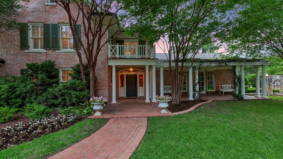 The home at 900 Alta Drive sits on nearly two acres.