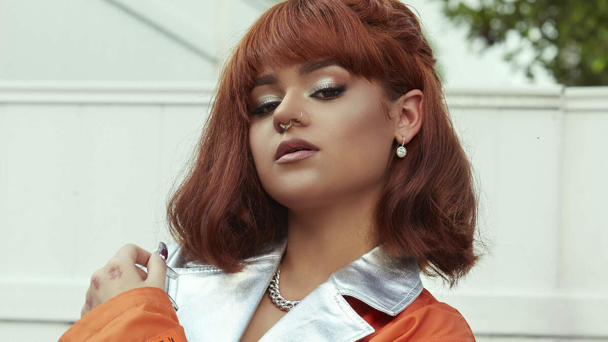 “Mi nombre artístico es un mezcla de dos nombres, el de mi mamá y el de mi papá ... así que lo fragmenté en Dalizz y me encantó”, declaró la cantante.