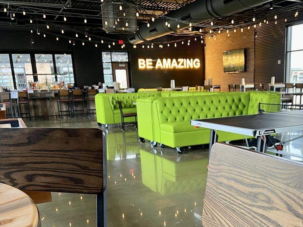 Chicken n Pickle has a large dining and bar area.