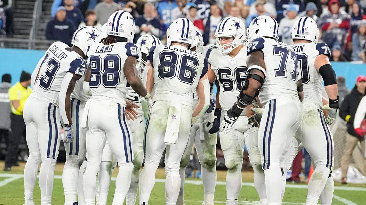 Dallas Cowboys huddle before a play during the second half of an NFL football game between the Tennessee Titans and the Dallas Cowboys on Thursday.