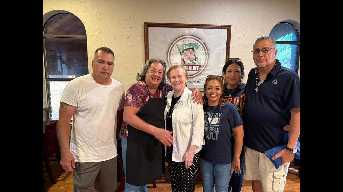 Brothers Edward and Joe Sotelo with former congresswoman Kay Granger at their family’s restaurant, Tia’s On The Bluff.