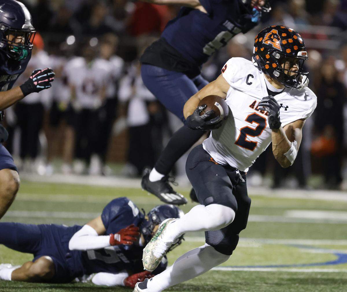 Aledo wide receiver Kaydon Finley (2) heads upfield against Frisco Lone Star during the first half of a UIL Class 5A Division I Semifinal on Friday Dec. 12, 2025 at Vernon Newsom Stadium in Mansfield, Texas.