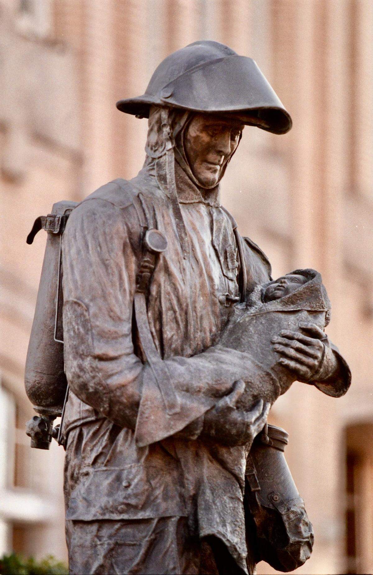 The “Save the Future” firefighter statue in front of Fort Worth Fire Station No. 2 at 1000 Cherry St. in downtown Fort Worth resembles a familiar news photo from the 1995 Oklahoma City bombing of a firefighter holding 1-year-old Baylee Almon. The state is by sculptors Jack and Cynthia Bryant.