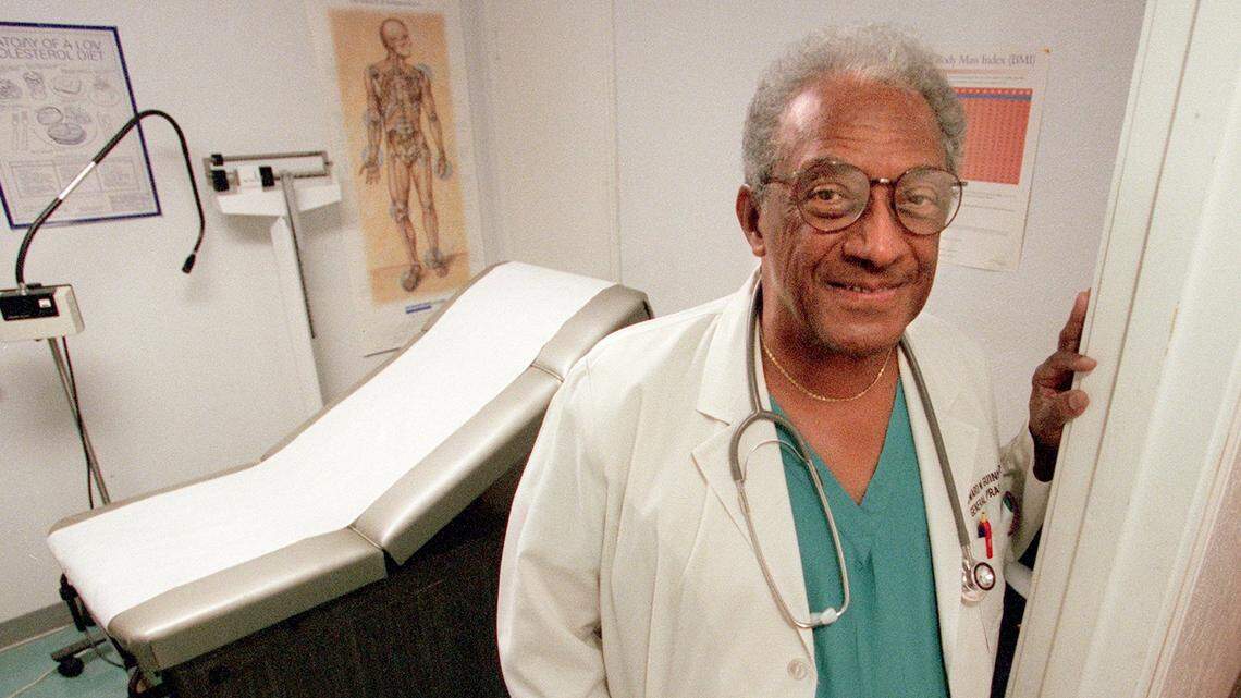 Dr. Edward Guinn, shown in this May 29, 2000, photograph at his practice in Stop Six.
