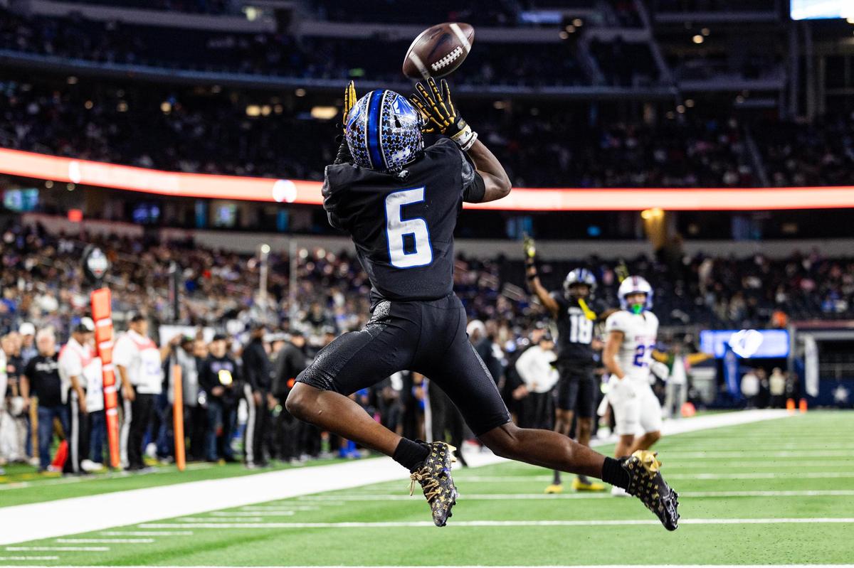 North Crowley wide receiver Quentin Gibson (6) catches his third touchdown of the game in the second half of the UIL 6A Division I state championship game against Austin Westlake at AT&T Stadium in Arlington on Saturday, Dec. 21, 2024.
