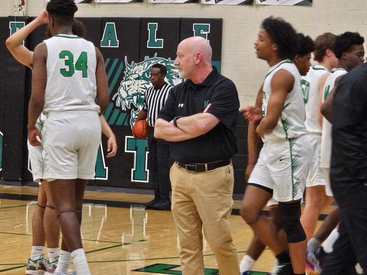 Kennedale coach Doug Groff, center, looks on after a time out in a game against Venus on Friday, February 7, 2025 at Kennedale High School in Kennedale, Texas