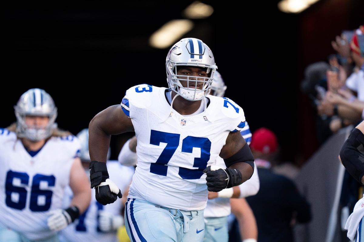 Dallas Cowboys offensive lineman Tyler Smith (73) runs onto the field before his game against the San Francisco 49ers  at Levi’s Stadium.